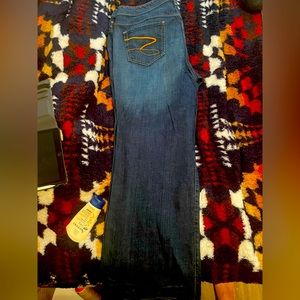 Dark denim jean pants. 7 brand